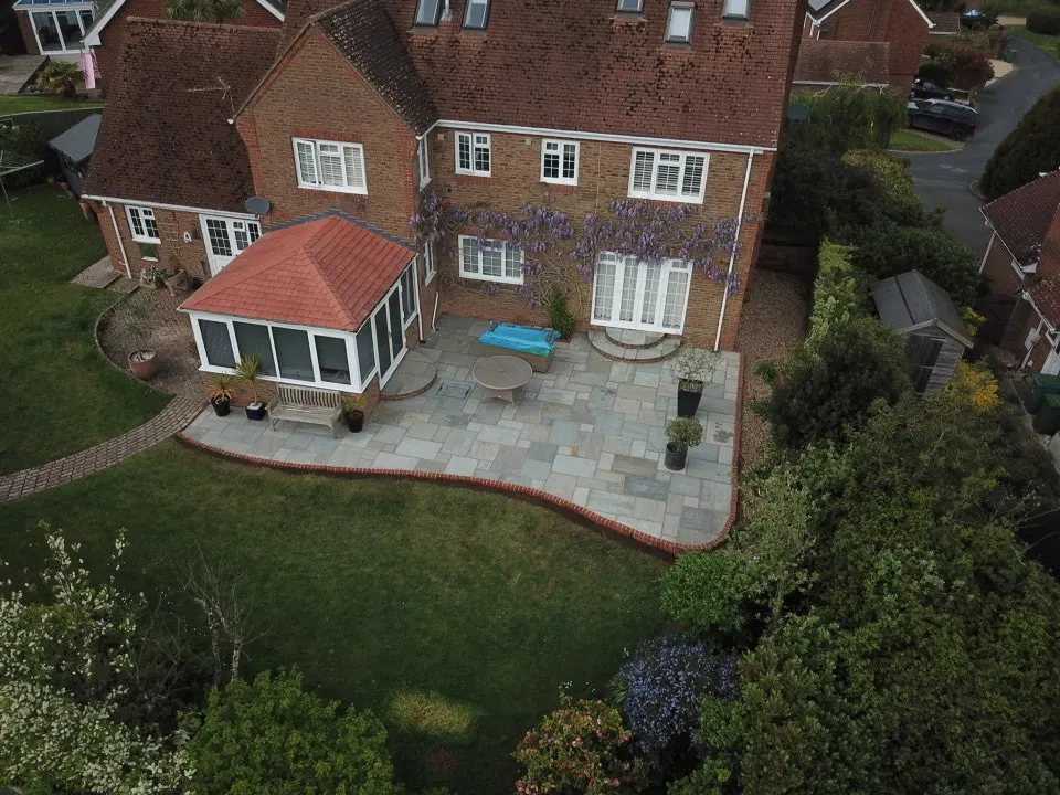 Aerial view of school grounds and a garden